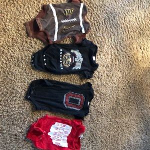 Allotment of 6 months sports onesies-